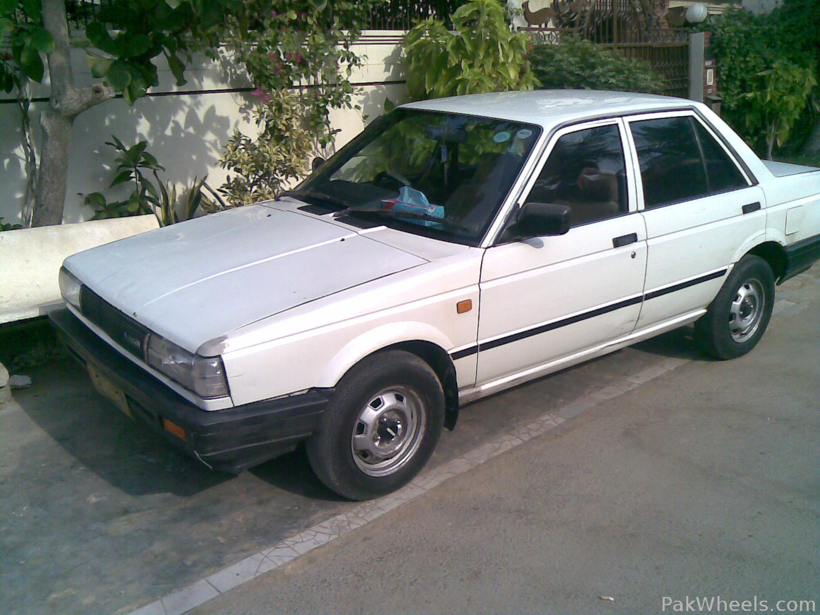 Used nissan sunny 2009 in pakistan #6