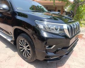 Toyota LandCruiser Prado TX-L 
Black night package 
Model 2019 fresh import June 2024
Mileage 23000 km 
Brand new condition ( spotless)
Black with black nappa leather interior
Electric glass Sunroof 
Multi power seats 
Front seats air conditioned & heated 
Five seater 
Eight zone climate control duel air conditioning 
Active cruise control 
Adapter Line accessed 
Adapted Radar
Bang & 0lufsen entertainment sound system 
Active navigation ,Bluetooth ,Apple play & android smart apps 
Multi cameras front & rear 
Four colour ambient light 
Cool box
TRD original factory fitted sports led body kit 
Sports side skirts 
19 “alloy wheels with new tyres 
Active power led headlamps 
TRD duel muffler 
Wooden steering wheel & full glossy wooden interior.
Further information please call & visit at Victory Cars jail road Lahore 
National wide delivery available.