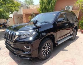 Toyota LandCruiser Prado TX-L 
Black night package 
Model 2019 fresh import June 2024
Mileage 23000 km 
Brand new condition ( spotless)
Black with black nappa leather interior
Electric glass Sunroof 
Multi power seats 
Front seats air conditioned & heated 
Five seater 
Eight zone climate control duel air conditioning 
Active cruise control 
Adapter Line accessed 
Adapted Radar
Bang & 0lufsen entertainment sound system 
Active navigation ,Bluetooth ,Apple play & android smart apps 
Multi cameras front & rear 
Four colour ambient light 
Cool box
TRD original factory fitted sports led body kit 
Sports side skirts 
19 “alloy wheels with new tyres 
Active power led headlamps 
TRD duel muffler 
Wooden steering wheel & full glossy wooden interior.
Further information please call & visit at Victory Cars jail road Lahore 
National wide delivery available.