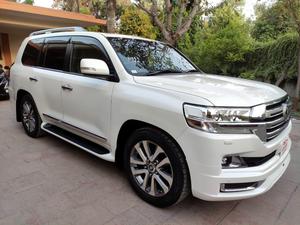 LandCruiser ZX ( V8 )  full house 
Model 2018/11 production 
Import 2023 unregistered 
Not a 100 km driven in Pakistan 
Mileage 28000 km
Pearl white metallic with brono leather interior 
4.5 AA as per auction sheet 
Brand new condition ( bumper to bumper original & spotless)
Top of line specs. 
Rear entertainment 
Cool box 
Wireless charger 
Original body kit 
Adapted Radar 
Further information please call & visit Victory Cars jail road Lahore