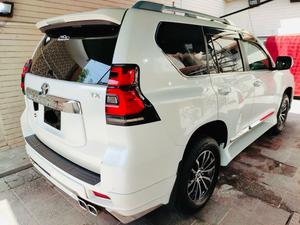 Toyota Prado TXL 2700cc
Model 2021 fresh import 2024
Unregistered 
5AA auction sheet
Pearl white with beige leather interior 
7 seater with sunroof 
Full body kit 
Further information please call & visit at Victory Cars jail road Lahore.