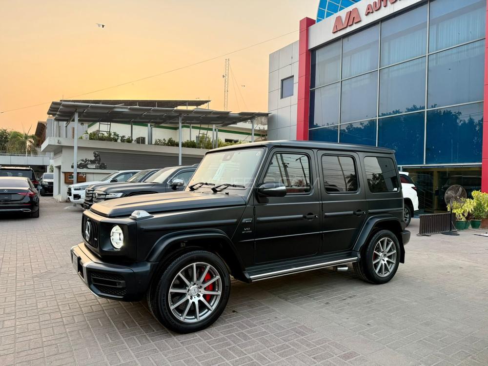 Mercedes Benz G63 AMG
V8 4.0 litre Biturbo
Model year 2020
Manufacturing Year 2019 end 
Fresh Import 2024
Milage 19000km 
Japan import
Satin black colour with red napa leather interior 


OPTIONS
•Active Lane Keeping Assist
•Red AMG brake callipers 
•Blind Spot Monitor
•Driver Assistance package Plus
•Smartphone integration CarPlay
•Sunroof
•Ambient lighting 
•Digital instrument cluster 
•360° camera
•Wider wheel arch for AMG wheels
•Parking package
•Switchable exhaust system
•AMG Performance steering wheel
•AMG Speedshift Plus 9G-Tronic
and many more options

Calling and Visiting Hours

Monday to Saturday

11:00 AM to 7:00 PM