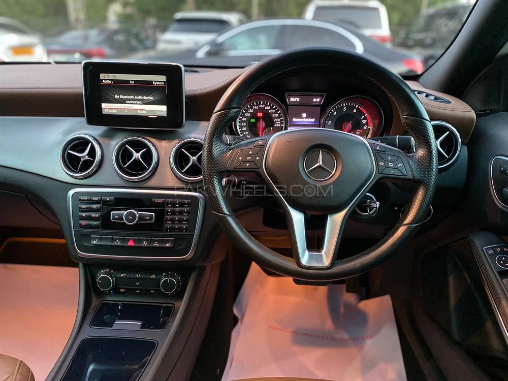 Mercedes GLA 200 AMG
Model: 2015
Mileage: 9,000 Km
Reg: 2015 Khi

Top of the line:
*Panoramic Roof
*Bucket leather seats
*Memory package 
*Privacy tint 
*Sports suspension 
*Leather dashboard