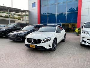 Mercedes GLA 200 AMG
Model: 2015
Mileage: 9,000 Km
Reg: 2015 Khi

Top of the line:
*Panoramic Roof
*Bucket leather seats
*Memory package 
*Privacy tint 
*Sports suspension 
*Leather dashboard