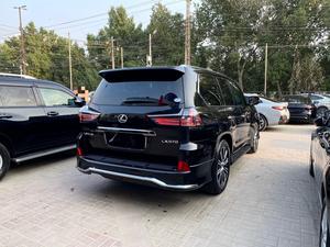 Make: Lexus Lx 570
Black Sequence Edition
Model: 2020
Mileage: 26,900 Km
Unregistered
Fresh Import 2025

TOP OF THE LINE:
*Diamond stich seats
*Mark levinson sound system
*Rear entertainment
*Original tv + 4 cameras
*Heads up Display
*Cool box
*Back auto door
*Heating/Cooling seats
*Sunroof
*Radar
*7 seater