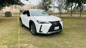 Lexus UX300e ( EV ) ultra luxury plus takumi package 
Model 2021/11 production fresh import 2024 from Japan.
Brand new vehicle ( spotless condition )
Pearl diamond metallic white with brono nappa leather interior.
Mileage 3000 km
Auction grade: 5AA
Battery range 375 km
Top of the Line specs.
All wheel drive ( AWD )
All seat heated & ventilated air conditioned 
Heated steering wheel 
Electric telescope steering wheel 
Memory & multi power electric seats 
Head up display 
Blind spot monitor ( BSM )
Lane  assistance 
3 mode driving modes
Lambs support 
Voice activation assistance 
Glass electric Sunroof 
Wireless charger 
Mark luvinson surround sound entertainment system with 15 speakers 
Privacy glass 
Power boot
Google maps & Apple CarPlay 
Adapted cruise control 
Adapted Radar
Airmatic electric sports suspension 
Parktronic sensors all sides
Auto pilot 
7 cameras 360 degrees 
18 “ Lexus note black Crome L sport alloy wheels.
Adapted auto laser active led headlamps 
11 kw charger