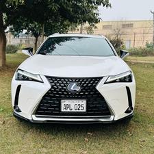 Lexus UX300e ( EV ) ultra luxury plus takumi package 
Model 2021/11 production fresh import 2024 from Japan.
Brand new vehicle ( spotless condition )
Pearl diamond metallic white with brono nappa leather interior.
Mileage 3000 km
Auction grade: 5AA
Battery range 375 km
Top of the Line specs.
All wheel drive ( AWD )
All seat heated & ventilated air conditioned 
Heated steering wheel 
Electric telescope steering wheel 
Memory & multi power electric seats 
Head up display 
Blind spot monitor ( BSM )
Lane  assistance 
3 mode driving modes
Lambs support 
Voice activation assistance 
Glass electric Sunroof 
Wireless charger 
Mark luvinson surround sound entertainment system with 15 speakers 
Privacy glass 
Power boot
Google maps & Apple CarPlay 
Adapted cruise control 
Adapted Radar
Airmatic electric sports suspension 
Parktronic sensors all sides
Auto pilot 
7 cameras 360 degrees 
18 “ Lexus note black Crome L sport alloy wheels.
Adapted auto laser active led headlamps 
11 kw charger