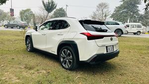 Lexus UX300e ( EV ) ultra luxury plus takumi package 
Model 2021/11 production fresh import 2024 from Japan.
Brand new vehicle ( spotless condition )
Pearl diamond metallic white with brono nappa leather interior.
Mileage 3000 km
Auction grade: 5AA
Battery range 375 km
Top of the Line specs.
All wheel drive ( AWD )
All seat heated & ventilated air conditioned 
Heated steering wheel 
Electric telescope steering wheel 
Memory & multi power electric seats 
Head up display 
Blind spot monitor ( BSM )
Lane  assistance 
3 mode driving modes
Lambs support 
Voice activation assistance 
Glass electric Sunroof 
Wireless charger 
Mark luvinson surround sound entertainment system with 15 speakers 
Privacy glass 
Power boot
Google maps & Apple CarPlay 
Adapted cruise control 
Adapted Radar
Airmatic electric sports suspension 
Parktronic sensors all sides
Auto pilot 
7 cameras 360 degrees 
18 “ Lexus note black Crome L sport alloy wheels.
Adapted auto laser active led headlamps 
11 kw charger