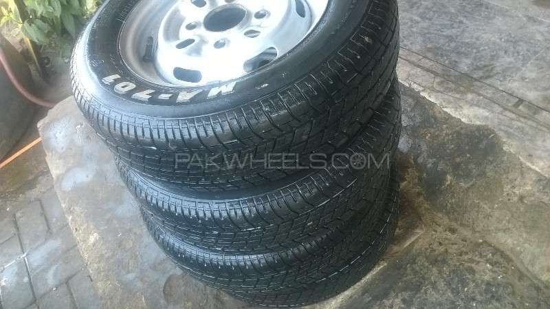 155/70 R12 Maxis white Letter tyres and rims steel v.good Image-1