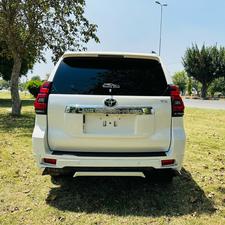 Toyota LandCruiser Prado 2700cc txl 
Model 2019 fresh import 2024 
Un-registered 
Pearl white metallic with beige leather interior 
Bumper to Bumper original condition ( spotless) 
7 seater with sunroof 
Multi power nappa leather electric seats 
Heated & cooling ( ventilated ) seats 
Cool box 
Multi zone duel climate control system 
B&o entertainment sound system
Multi cameras 
Adapted Radar 
Active line accessed 
Adapted cruise control 
Auto parking accessible 
All zone parktronic sensors 
Full  glossy wooden interior 
Full trd sport body kit 
Crome package 
Further information please contact & visit Victory Cars jail road Lahore