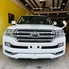 Toyota LandCruiser AX-G V8 4500cc
Model 2020 , fresh import March 2025
Mileage 29000 km , 
Auction grade 4.5 
Pearl White metallic with beige nappa leather interior ( new shade 2020 )
Brand new condition ( spotless)
Sunroof 
Leather multi power electric seats 
Electric Cool box 
8 zone climate control dual air conditioning 
Adapter cruise control 
Adapted Radar & line accessed 
Full wooden interior with ambient interior lighting 
Adaptive led all climate headlamps 
Tasla monitor installed  with android apps, Apple CarPlay & active navigation 
Full ZX customised fittings 
20” alloy wheels 
Full Crome package 
Full original factory fitted Modulista body kit 
Further information please call & visit at Victory Cars jail road Lahore.