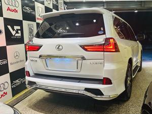 Lexus LX570 (ultra sports utility package)
Model 2019 fresh import 2025
Unregistered 
Diamond White metallic with orinzo bronze nappa leather interior 
Brand new condition ( spotless )
Mileage 22000 km 
Auction grade 5 AA
Top of the line specs ( full house )
Original body kitted 
Further information please call & visit at Victory Cars jail road Lahore.