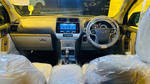Toyota LandCruiser Prado TX-L 
Mode 2019 fresh import ( unregistered)
Mileage 33000 km
Pearl white with beige leather interior 
Brand new condition ( spotless)
Auction grade 4.5
7 seater with sunroof 
Top of line specs.
Nappa leather multi power seats with heated & ventilated ( air conditioning)
B/o premium entertainment sound system.
Multi cameras 
Customised fitting 
Crome package 
8 zone climate control air conditioning system 
Adapted active Radar 
Line accessed 
Adapted cruise control system 
All zone parktronic sensors 
Full body kit
18” alloy wheels with new tyres.
Further information please call & visit at Victory Cars jail road Lahore.