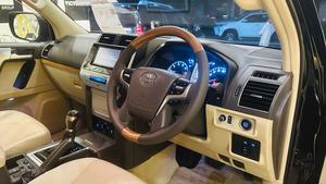 Toyota LandCruiser Prado TXL 2700cc eco/pro.
Model 2020 import April 2025
Brand New vehicle ( spotless condition )
Mileage 49000 km
Auction grade 4.5 A 
Silky black with ash white interior 
Top of the line specs,
All 7seats nappa leather 
Heated & ventilated ( air conditioning) seat 
Glass electric sunroof 
All zone climate control air conditioning 
Adapted Radar 
Active line accessed & blind spot monitor.
Adaptive cruise control 
Premium sound system with 16 speakers 
Cool box 
Full trd original body kit 
19” alloy wheels 
Crome package 
Further information please call & visit at Victory Cars jail road Lahore