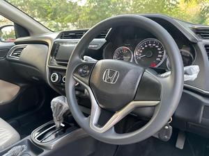 HONDA CITY 1.2L CVT (1200cc) AUTOMATIC 
Model 2024 || Registered 2024
8,000 KM Driven verifiable
HONDA SHAHRAH E FAISAL MAINTAINED 
Bumper To Bumper Original 100% 
Pearl Black Color 
Beige room
Interior is as good as new
COMPANY SEALS STILL INTACT
Original NAVIGATION 
ECON Mode
Like a brand new car

For inspection
Available at SUPREME CARS
Plot # 151/F,Under Imam heights,Shop no.1&2, Main Khalid Bin Walid Rd, Karachi, Sindh 75400

|  Premium Cars  |  Best Prices  |  Optimum Performance | 
#Supremecarsgang