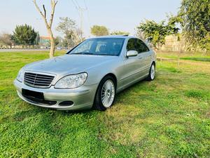 Mercedes-Benz S350 3700cc V6
Model 2004 ( production 2003/12 )
Import from Japan 2007 registered 2010 in Islamabad 
First owner driven 
Mileage  72000
Excellent condition ( original paint & spotless)
Metallic silver colour & black nappa leather interior.
Top of the line specs.
Sunroof, multi power seats, heated seats, massager seats, electric curtains, aromatic suspension, Xinon headlights, electric boot, cool box , premium sound system. Duel climate control air conditioning.
Further information please call & visit at Victory Cars jail road Lahore