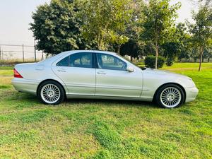 Mercedes-Benz S350 3700cc V6
Model 2004 ( production 2003/12 )
Import from Japan 2007 registered 2010 in Islamabad 
First owner driven 
Mileage  72000
Excellent condition ( original paint & spotless)
Metallic silver colour & black nappa leather interior.
Top of the line specs.
Sunroof, multi power seats, heated seats, massager seats, electric curtains, aromatic suspension, Xinon headlights, electric boot, cool box , premium sound system. Duel climate control air conditioning.
Further information please call & visit at Victory Cars jail road Lahore