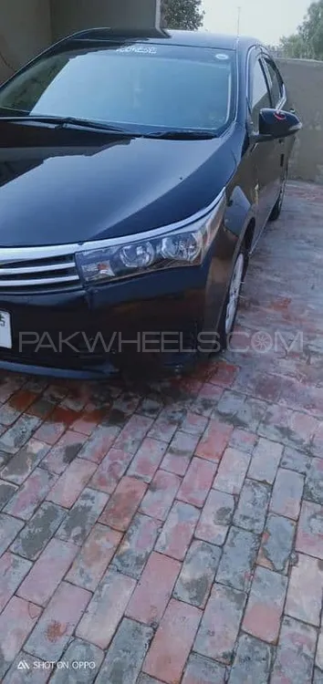 Toyota Corolla 2015 for Sale in Hujra Shah Mukeem Image-1