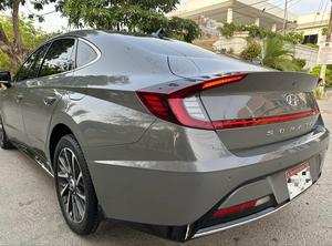HYUNDAI SONATA 2.0 (2000cc)
Model 2022 || Registered 2022
Hampton Grey Color 
Bumper to Bumper Original 100% Guaranteed 
26,000kms Driven Genuine 100%
Panoramic Roof
Wireless Charger
Dual Power Seats
Harmon Kardon Speakers
All seals still intact 
READY DELIVERY 
EXCHANGE POSSIBLE WITH ANY CAR
 
For inspection
Available at SUPREME CARS
Plot # 151/F,Under Imam heights,Shop no.1&2, Main Khalid Bin Walid Rd, Karachi, Sindh 75400

|  Premium Cars  |  Best Prices  |  Optimum Performance | 
#supremecarsgang