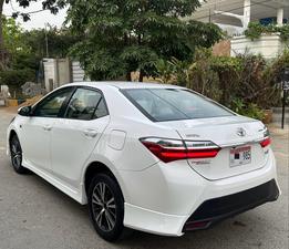TOYOTA COROLLA ALTIS X 1.6 AUTOMATIC NEW SHAPE (1600cc)
Model 2021 || Registered 2021
Only 36,000 KM
SUPER WHITE Color
Left Side 2 pcs and Right Side 1 pc Repainted on Scratches 
Company Maintained 
AUTOMATIC Transmission
ORIGINAL X NEW SHAPE
Original ALPINE TV
Just like Brand New
READY DELIVERY 
EXCHANGE POSSIBLE WITH ANY CAR

For inspection
Available at SUPREME CARS
Plot # 151/F,Under Imam heights,Shop no.1&2, Main Khalid Bin Walid Rd, Karachi, Sindh 75400

|  Premium Cars  |  Best Prices  |  Optimum Performance | 
#Supremecarsgang