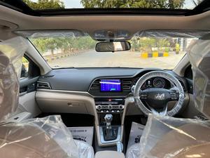 HYUNDAI ELANTRA GLS TOP OF THE LINE NEW RIMS (2000cc)
Model 2021 December || Registered 2022
Only 25,300 KM 100% Genuine 
Hyundai South Maintained 
Cyber Grey Color 
Bumper to bumper original guaranteed 100 %
TOP OF THE LINE
Original NEW TV Back Cam
Original NEW Leather Seats
Original NEW RIMS
Sunroof 
Wireless Charger
Dual Power Seats
Spare Wheel Unused 
Fog lights
Just Like Zero Meter 
All seals still intact 
See to Believe 
Ready Delivery 
EXCHANGE POSSIBLE WITH ANY CAR

For inspection
Available at SUPREME CARS
Plot # 151/F,Under Imam heights,Shop no.1&2, Main Khalid Bin Walid Rd, Karachi, Sindh 75400

|  Premium Cars  |  Best Prices  |  Optimum Performance | 
#supremecarsgang
