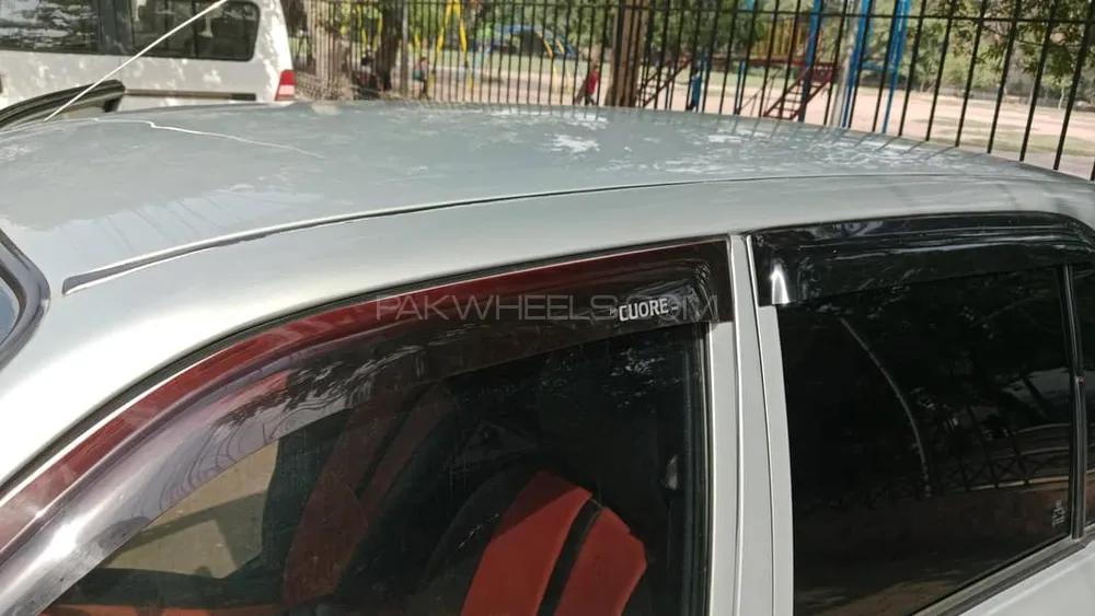 Daihatsu Cuore 2011 for Sale in Faisalabad Image-1