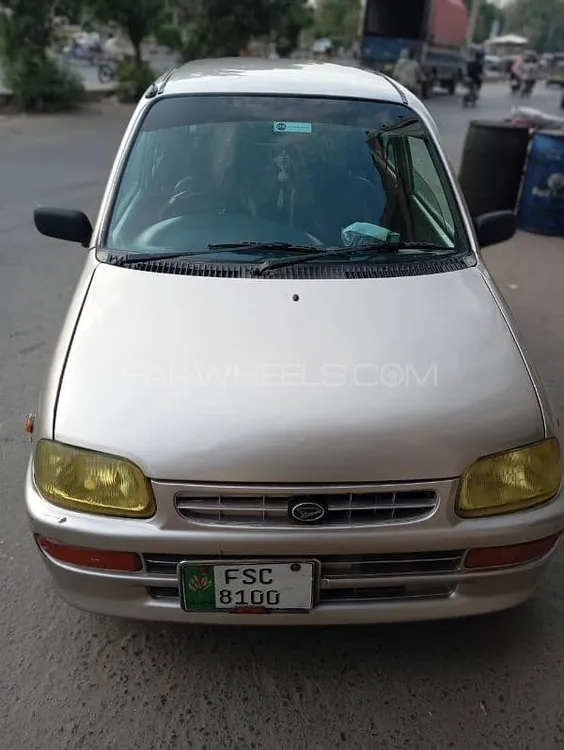 Daihatsu Cuore 2004 for Sale in Faisalabad Image-1