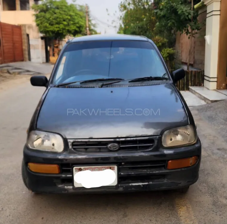 Daihatsu Cuore 2004 for Sale in Faisalabad Image-1
