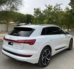 AUDI ETRON 50 QUATTRO TOP OF THE LINE (230KW)
Model 2022 || Registration 2022 
Choice Registered *800*
10,000 miles Driven 
Audi Maintained 
White Color
Bruno Interior
Bumper to Bumper Original Paint 100%
Scratch-less & Spotless
FULL HOUSE 
Just as good as Brand New   
Original TV 
Original Rims 
Still Smells like zero meter 
SEE TO BELIEVE 
READY DELIVERY 
EXCHANGE POSSIBLE WITH ANY CAR

For inspection
Available at SUPREME CARS
Plot # 151/F,Under Imam heights,Shop no.1&2, Main Khalid Bin Walid Rd, Karachi, Sindh 75400

|  Premium Cars |  Best Prices |  Optimum Performance | 
#supremecarsgang