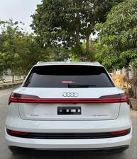 AUDI ETRON 50 QUATTRO TOP OF THE LINE (230KW)
Model 2022 || Registration 2022 
Choice Registered *800*
10,000 miles Driven 
Audi Maintained 
White Color
Bruno Interior
Bumper to Bumper Original Paint 100%
Scratch-less & Spotless
FULL HOUSE 
Just as good as Brand New   
Original TV 
Original Rims 
Still Smells like zero meter 
SEE TO BELIEVE 
READY DELIVERY 
EXCHANGE POSSIBLE WITH ANY CAR

For inspection
Available at SUPREME CARS
Plot # 151/F,Under Imam heights,Shop no.1&2, Main Khalid Bin Walid Rd, Karachi, Sindh 75400

|  Premium Cars |  Best Prices |  Optimum Performance | 
#supremecarsgang