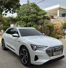 AUDI ETRON 50 QUATTRO TOP OF THE LINE (230KW)
Model 2022 || Registration 2022 
Choice Registered *800*
10,000 miles Driven 
Audi Maintained 
White Color
Bruno Interior
Bumper to Bumper Original Paint 100%
Scratch-less & Spotless
FULL HOUSE 
Just as good as Brand New   
Original TV 
Original Rims 
Still Smells like zero meter 
SEE TO BELIEVE 
READY DELIVERY 
EXCHANGE POSSIBLE WITH ANY CAR

For inspection
Available at SUPREME CARS
Plot # 151/F,Under Imam heights,Shop no.1&2, Main Khalid Bin Walid Rd, Karachi, Sindh 75400

|  Premium Cars |  Best Prices |  Optimum Performance | 
#supremecarsgang