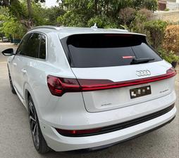 AUDI ETRON 50 QUATTRO TOP OF THE LINE (230KW)
Model 2022 || Registration 2022 
Choice Registered *800*
10,000 miles Driven 
Audi Maintained 
White Color
Bruno Interior
Bumper to Bumper Original Paint 100%
Scratch-less & Spotless
FULL HOUSE 
Just as good as Brand New   
Original TV 
Original Rims 
Still Smells like zero meter 
SEE TO BELIEVE 
READY DELIVERY 
EXCHANGE POSSIBLE WITH ANY CAR

For inspection
Available at SUPREME CARS
Plot # 151/F,Under Imam heights,Shop no.1&2, Main Khalid Bin Walid Rd, Karachi, Sindh 75400

|  Premium Cars |  Best Prices |  Optimum Performance | 
#supremecarsgang