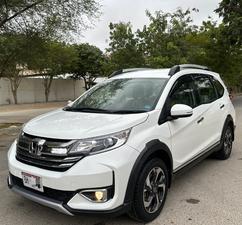 HONDA BRV S PACKAGE TOP OF THE LINE NEW SHAPE PUSH START LIMITED EDITION(1500cc)
Model 2020 || Registered 2020
Only Genuine 28,000 KM
Taffeta White Color
Bumper to Bumper Original 100%
Guaranteed 
Scratch-less Spotless  
Push start
Centre console/ Hand-rest
Automatic Transmission
Original TV NAV
Climate Control
New Grill 
Original Fog Lights
Genuine Rims
Just like Zero Meter
All Seals Still Intact 
EXCHANGE POSSIBLE WITH ANY CAR

For inspection
Available at SUPREME CARS
Plot # 151/F,Under Imam heights,Shop no.1&2, Main Khalid Bin Walid Rd, Karachi, Sindh 75400

|  Premium Cars  |  Best Prices  |  Optimum Performance | 
#supremecarsgang