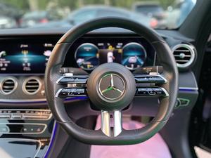 Mercedes E180 AMG
Model: 2021
Mileage: 6,000 Kn
Reg: 2021 Khi

*Apple Carplay smartphone integration
*Rear view camera
*AMG line interior & exterior
*Panoramic glass sunroof
*Active Parking Assist
*Digital instrument cluster
*Electric memory seats
*Tire pressure monitor
*Suspension for greater ground clearance
*Headliner, black fabric
*LED headlamps
*Privacy glass
*Burmester sound system
*Parking Package
*Night package
*Mirror package

Shahnawaz import and maintained

Calling and Visiting Hours 

Monday to Saturday 

11:00 AM to 7:00 PM
