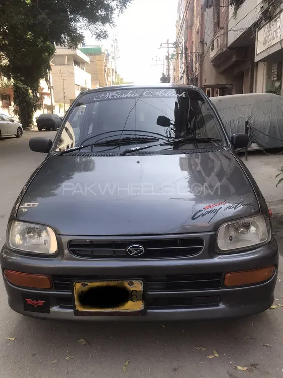 Daihatsu Cuore 2011 for Sale in Karachi Image-1