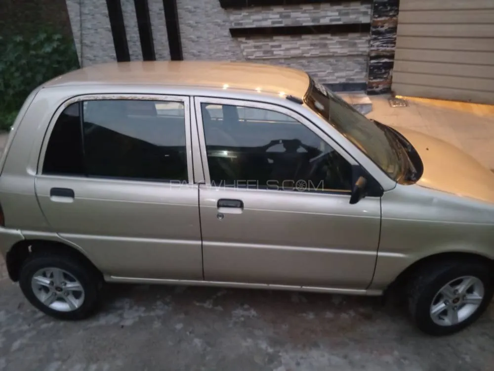 Daihatsu Cuore 2010 for Sale in Faisalabad Image-1