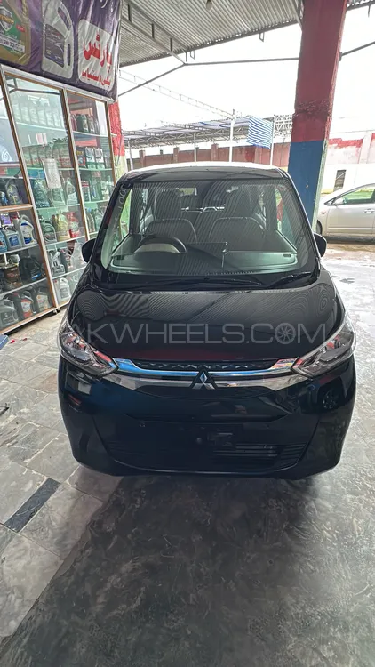 مٹسوبیشی ای کے ویگن 2024 for Sale in اسلام آباد Image-1