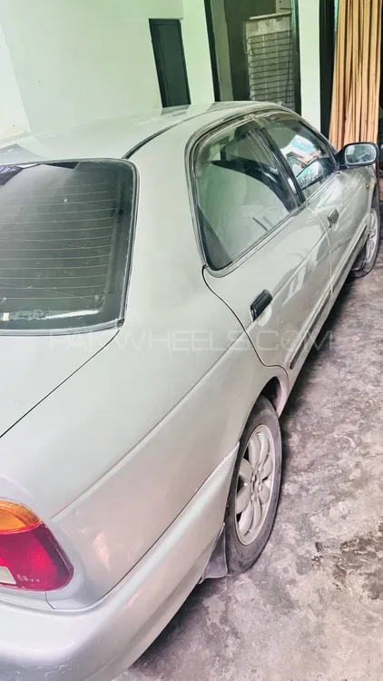 Suzuki Baleno 2004 for Sale in Faisalabad Image-1