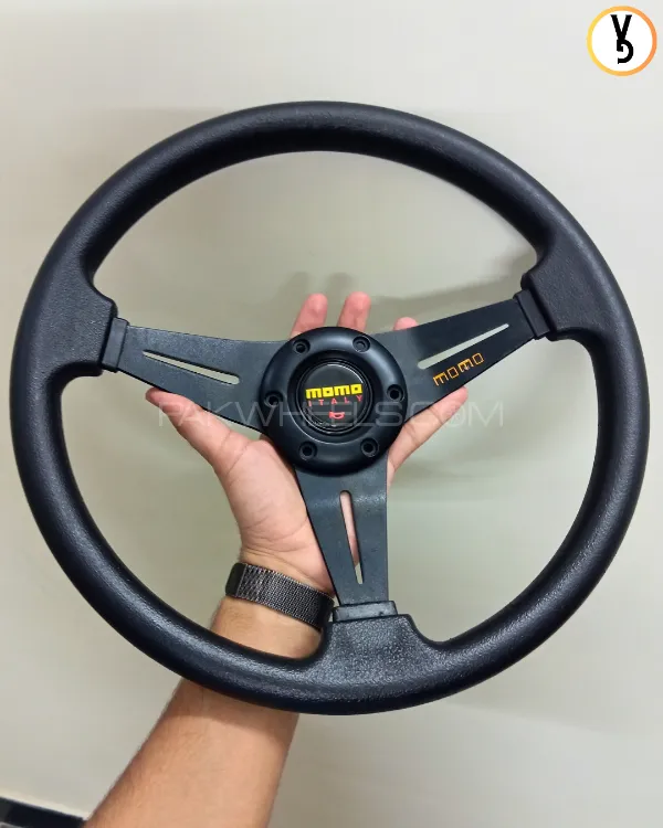 BRAND NEW MOMO STEERING WHEEL IN BLACK IS NOW AVAILABLE FOR SALE AT VOGUEGARAGEPK  Image-1