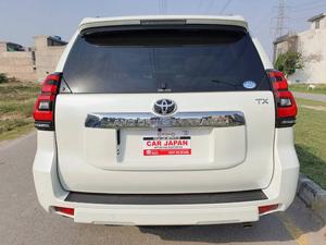 Fresh Import 2025
TX L Package
2020 Model
Very Low Mileage: 9672 KM
Shiny Pearl White Colour 
(Leather Electric Heating & Cooling Seats)
Colour: Pearl White
Beige Interior
7 Seats
19 Inches Original Alloy Rims
Sunroof
Toyota Genuine Navigation System
Toyota Genuine TV
Toyota Genuine Back Camera
No.1 Japan Quality
5 AA Auction Grade And Genuine Verifiable Auction Sheet
Auction Sheet Attach For Satisfaction And Verification
Modelista Genuine Body Kit (Front & Back)
Genuine New Model
Genuine New Interior
Prado Super Live Sound System
14 Speaker
Shiny Pearl White Color
Intelligent Entertainment
Digital TV
Led Head Lamp
100% Original
4WD,ETC
Multi-Function Steering Controls
Fog Lamps
Genuine New Front Grill
Steering Gear Type: Rack & Pinion Type With Power Assist
Retractable Side Mirrors With Indicators
All Windows Full Automatic (One Touch Up/down)
Immobilizer (Anti-theft)
Digital Climate Control A/c & Heater
Rain Visors
8 Airbags