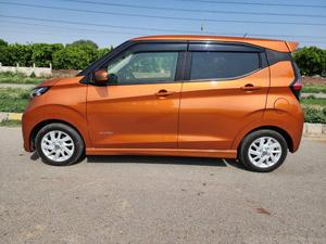 Fresh Import 2025
No.1 Japan Quality
Highway Star X Edition 
Original Tv With Apple Car Play 
Adaptive Cruise Control 
2022 Model
Shiny Orange Colour
Low Mileage 46904 km
100% Electric
20 kWh lithium-ion Battery	
Limited Edition 
Electric range 180 km According to 
Nissan Motor Corporation Japan 
Electronic Parking Break
Zero Emission
Push Start Engine / Intelligent Key
Auto Ac Touch Panel
LED Head Lump
Super UV Cut Doors Glass
Intelligent Around View Monitor
Genuine Verifiable Auction Sheet
3.5 Grade and Auction Sheet Attach For Satisfaction
9 Inch Navigation System
Back Camera
Remote Door Mirror
Abs Braking System
Traction Control
Hid Headlights
Retractable Side Mirrors With Indicators
Winker Mirror
Digital Climate Control Air Conditioning System
6 Air Bags for Perfect Safety
All Power Windows
Multimedia Steering
Engine In Clean & Good Condition
Clean Interior & Exterior
Power Steering
Dual SRS Air Bag
High Quality Luxury Hatchback
Brand New Tyres