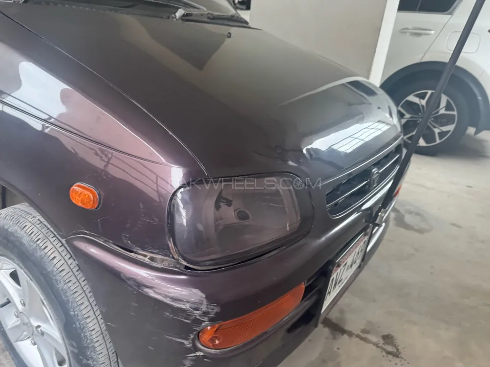 Daihatsu Cuore 2012 for Sale in Karachi Image-1