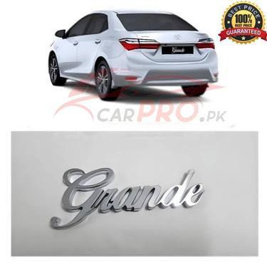 Grande Monogram For Toyota Corolla - Grande Logo in Chrome - Toyota Rear Trunk Grande Logo. Grande Monogram For Toyota Corolla - Grande Logo in Chrome - Toyota Rear Trunk Grande Logo.