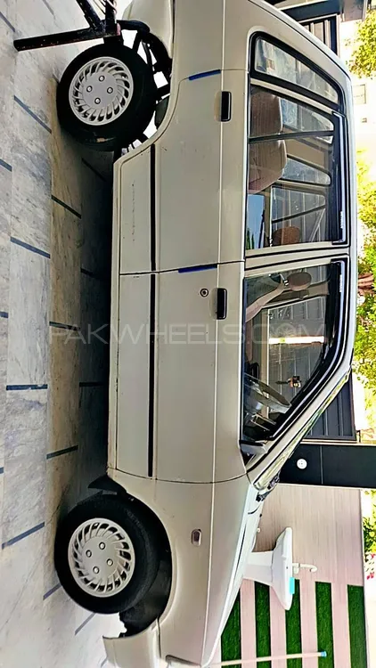 Suzuki Mehran 2013 for Sale in Faisalabad Image-1