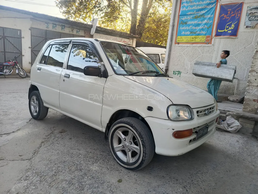 Daihatsu Cuore 2004 for Sale in Abbottabad Daihatsu Cuore 2004 for Sale in Abbottabad Image-7
