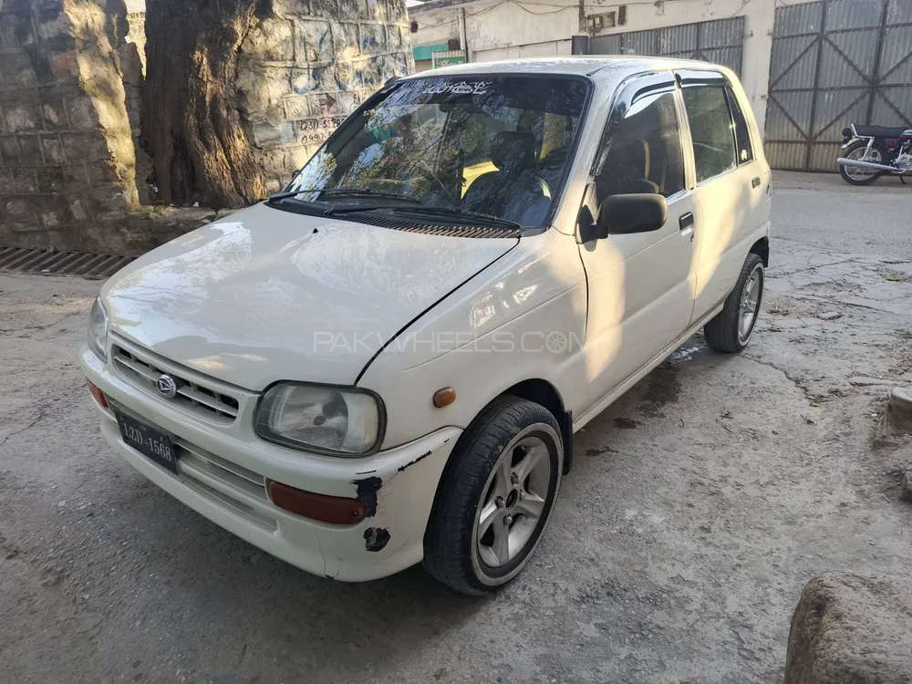 Daihatsu Cuore 2004 for Sale in Abbottabad Daihatsu Cuore 2004 for Sale in Abbottabad Image-3
