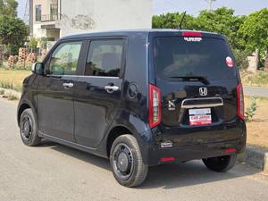 Fresh Import 2025 
L Bitter Special Package
Model: 2022
Low Mileage: 22758 KM
Shiny Dark Blue Colour
Leather steering Wheel 
Remote Keyless Entry
No.1 Japan Quality
Adaptive Cruise Control
Push Start Engine
Fully Automatic Air Conditioner
Navigation System
Back Camera
Led Headlights
Auto Brake Hold Function
Heated Seats
Engine In Clean & Good Condition
No.1 Japan Quality
All Power Windows
Led Sequential Turn Signal Lamps (Front) &
Full Led Rear Combination Lamps
Eco Idle Technology
Runs & Drives Great
Clean Interior & Exterior
Power Steering
Rear Wiper
Immobilizer
Sofa Seats
Winker Mirror
Retract Mirrors
According To Honda Motor Corporation Japan 29.4 Km/l
Glass With Ultra-violet Filter
Steering: Power Assist Equipped Rack & Pinion
8 SRS Air Bag
Traction Control
High Quality Luxury Hatchback
Brand New Tyres
Anti-lock Brakes
Passenger Airbag
Fully Loaded