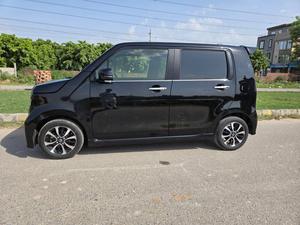 Fresh Import 2025 
Custom Package
Model: 2023
Low Mileage: 46093 KM
Shiny Pearl Black Colour
14 Inch Alloy Wheels  
Leather steering Wheel 
Remote Keyless Entry
No.1 Japan Quality
Custom Edition
Adaptive Cruise Control
Push Start Engine
Fully Automatic Air Conditioner
Navigation System
Back Camera
Led Headlights
Auto Brake Hold Function
Heated Seats
Engine In Clean & Good Condition
No.1 Japan Quality
All Power Windows
Led Sequential Turn Signal Lamps (Front) &
Full Led Rear Combination Lamps
Eco Idle Technology
Runs & Drives Great
Clean Interior & Exterior
Power Steering
Rear Wiper
Immobilizer
Sofa Seats
Winker Mirror
Retract Mirrors
According To Honda Motor Corporation Japan 29.4 Km/l
Glass With Ultra-violet Filter
Steering: Power Assist Equipped Rack & Pinion
8 SRS Air Bag
Traction Control
High Quality Luxury Hatchback
Brand New Tyres
Anti-lock Brakes
Passenger Airbag
Fully Loaded