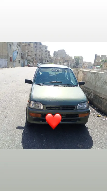 Daihatsu Cuore 2011 for Sale in Karachi Image-1