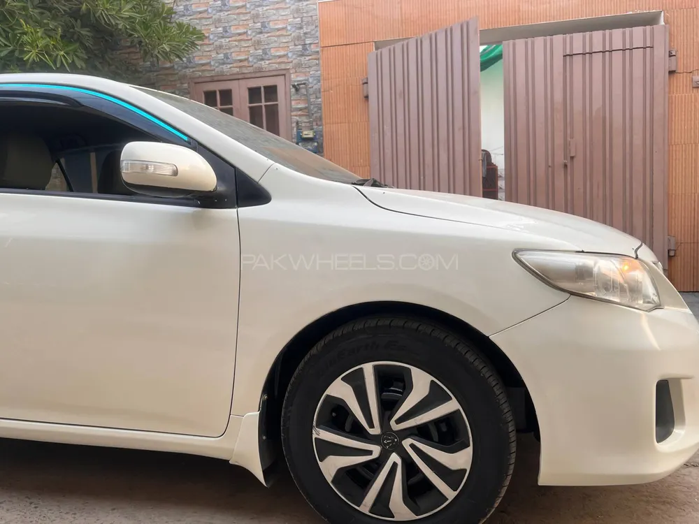 Toyota Corolla 2014 for Sale in Faisalabad Toyota Corolla 2014 for Sale in Faisalabad Image-14